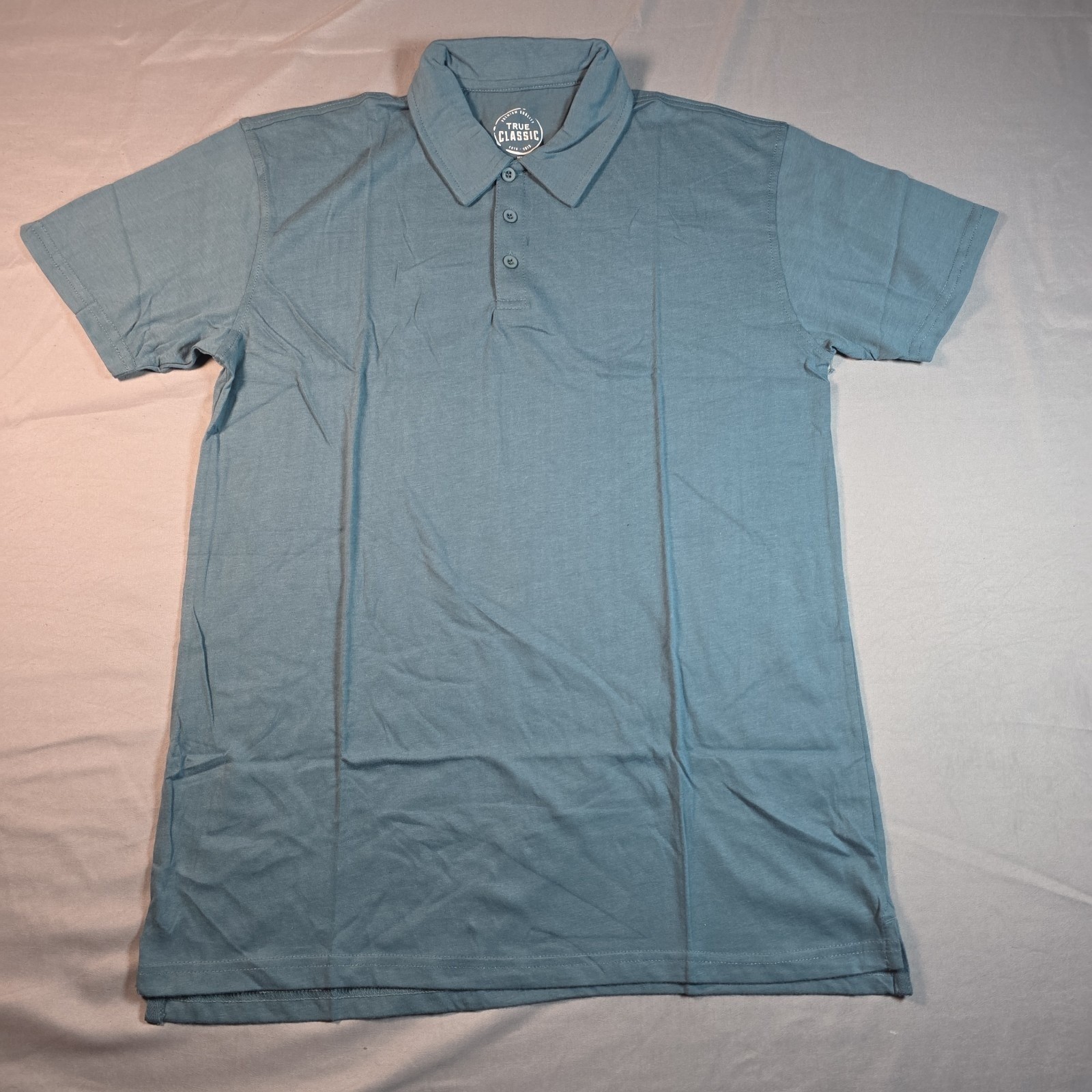 True Classic Polo Med (3 pack) Light Heathered Blue, Turquoise, Heathered Purple