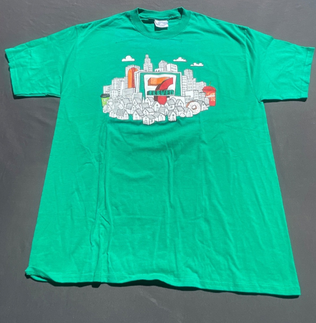MENS VINTAGE GREEN NOVELTY 7-11 SHIFT TEE ST089