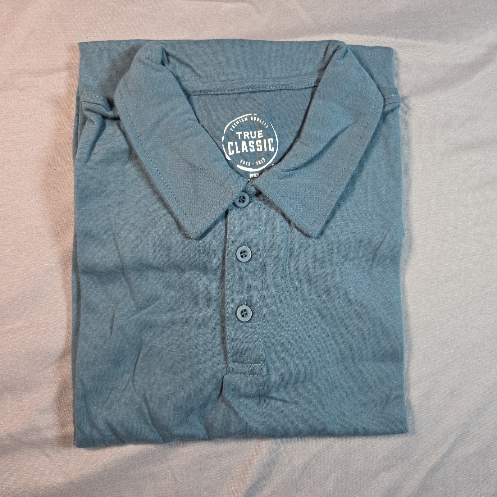 True Classic Polo Med (3 pack) Light Heathered Blue, Turquoise, Heathered Purple