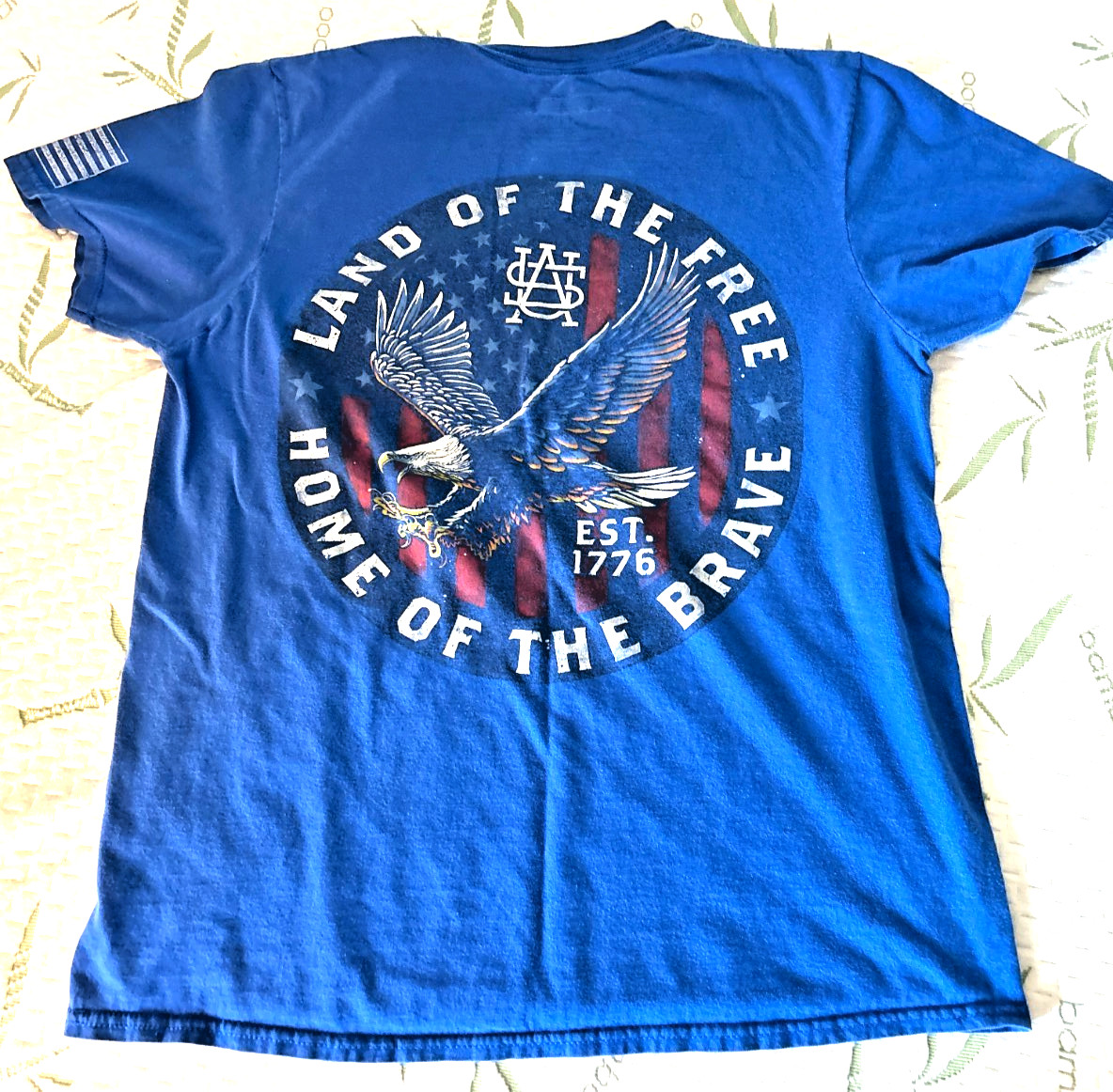 Buckwear “Home of the Free, Home of the Brave” Blue T-Shirt, Med. Mens